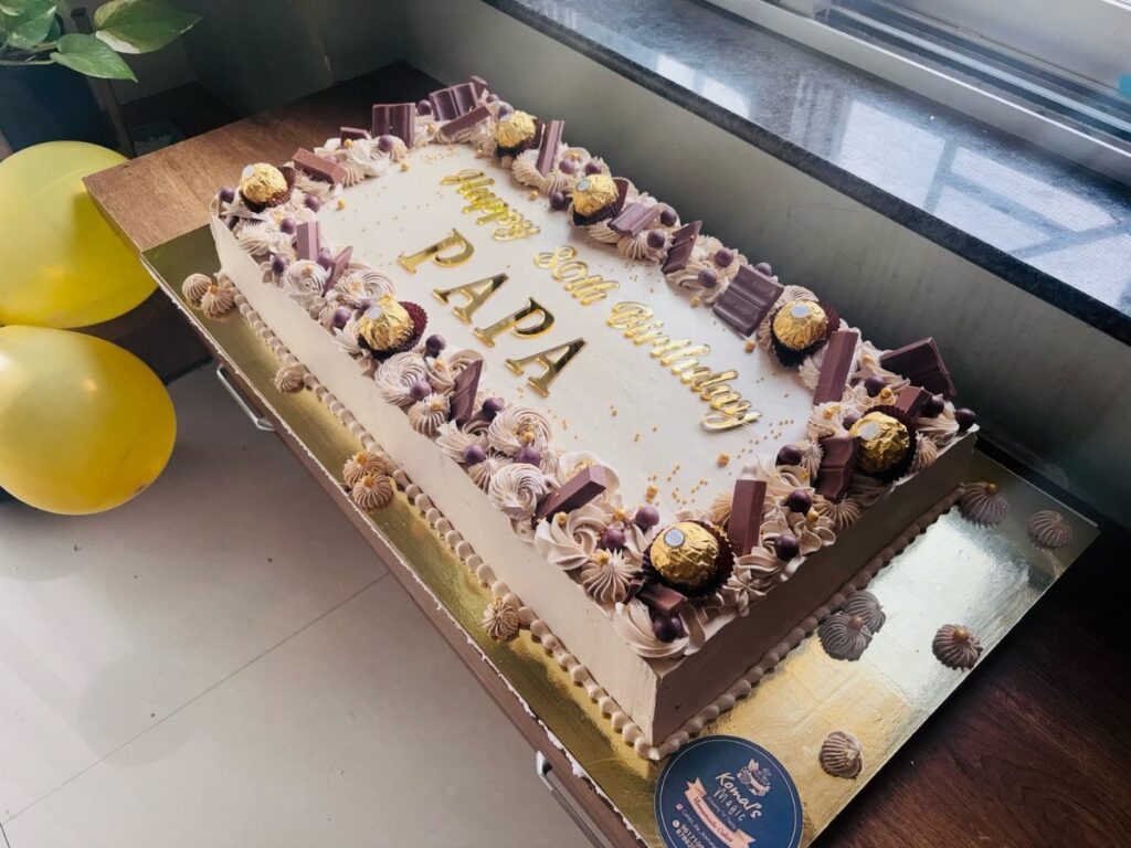 Rectangular 80th birthday sheet cake for Papa with chocolate and gold decorations